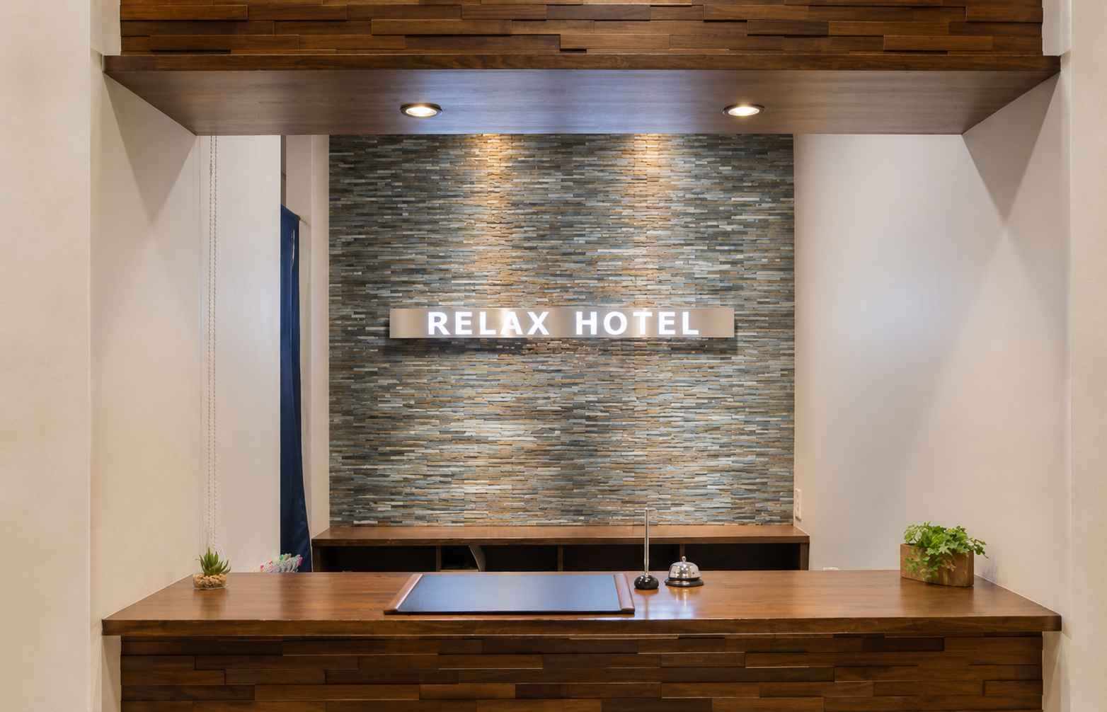 Reception desk at Relax Hotel Takayama Station